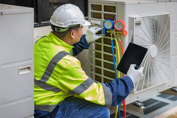 Professional Hvac technician working in Wells, ME